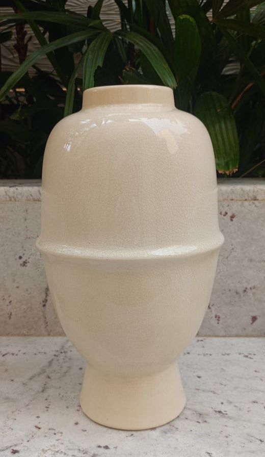 Oval shaped off white flower Vase
