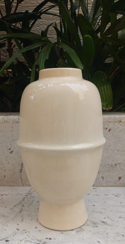 Oval shaped off white flower Vase