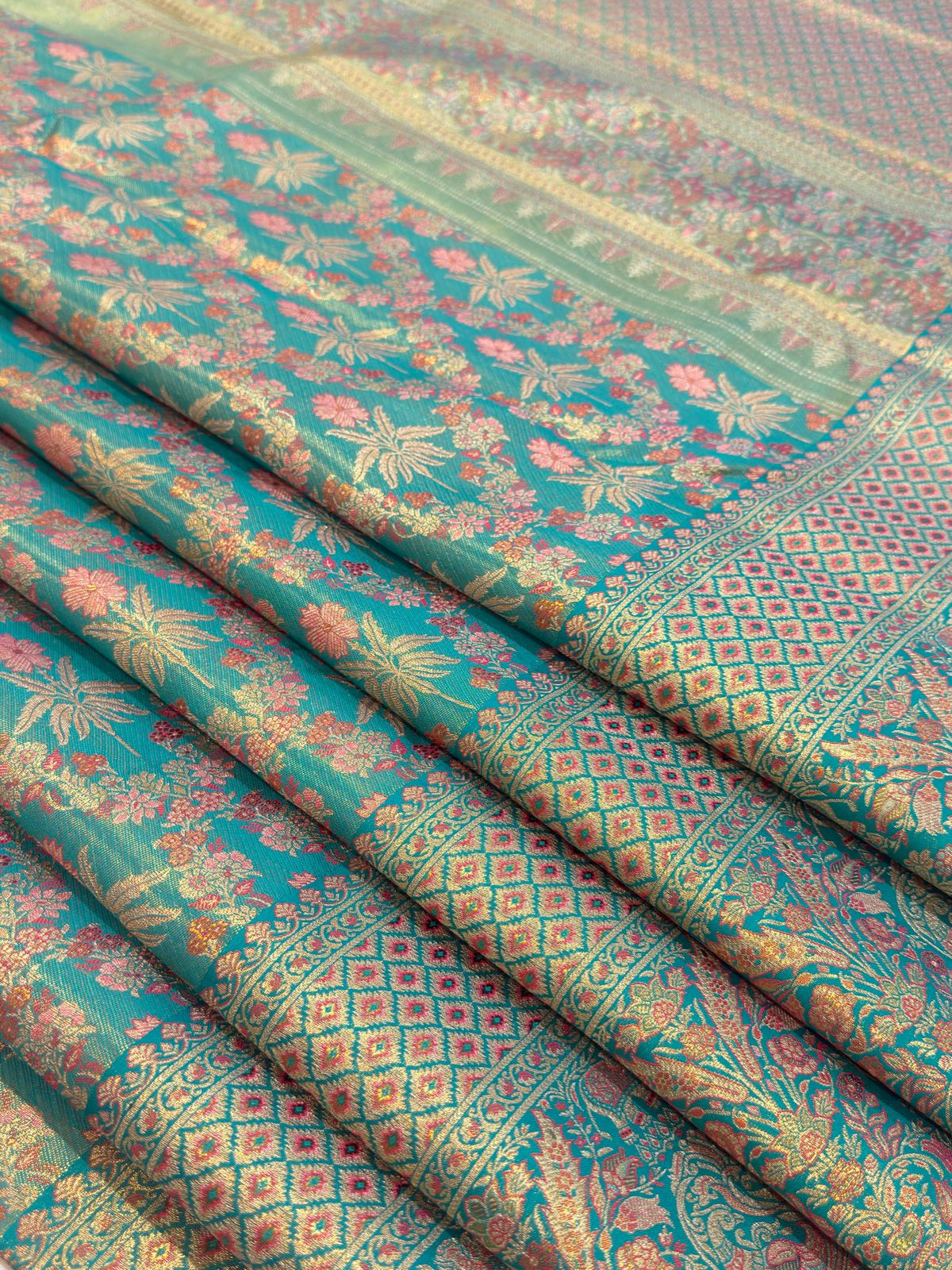 Teal Grandeur Kanjivaram Meenakari Saree
