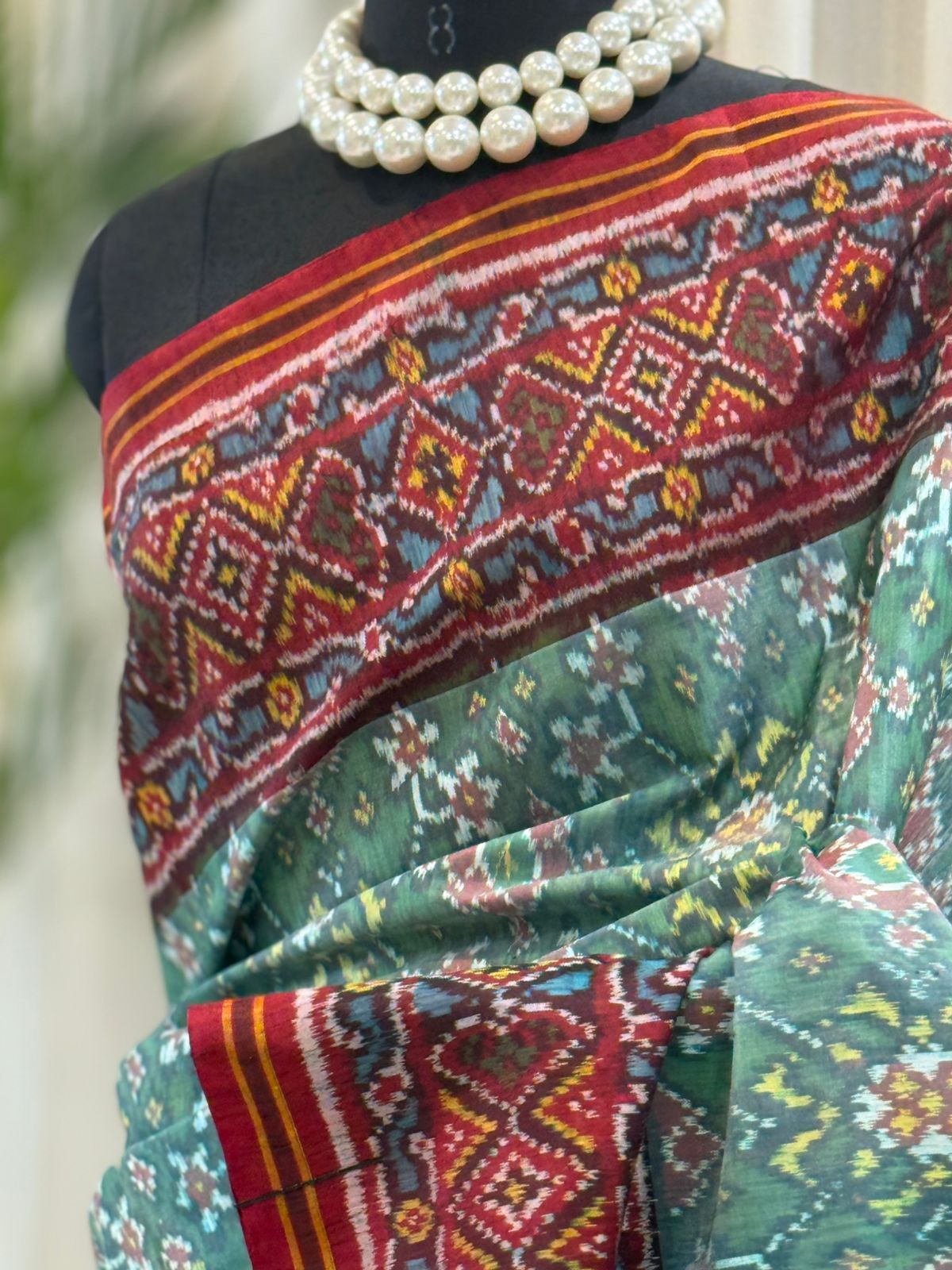 Maroon Green Handwoven Patola Elegance