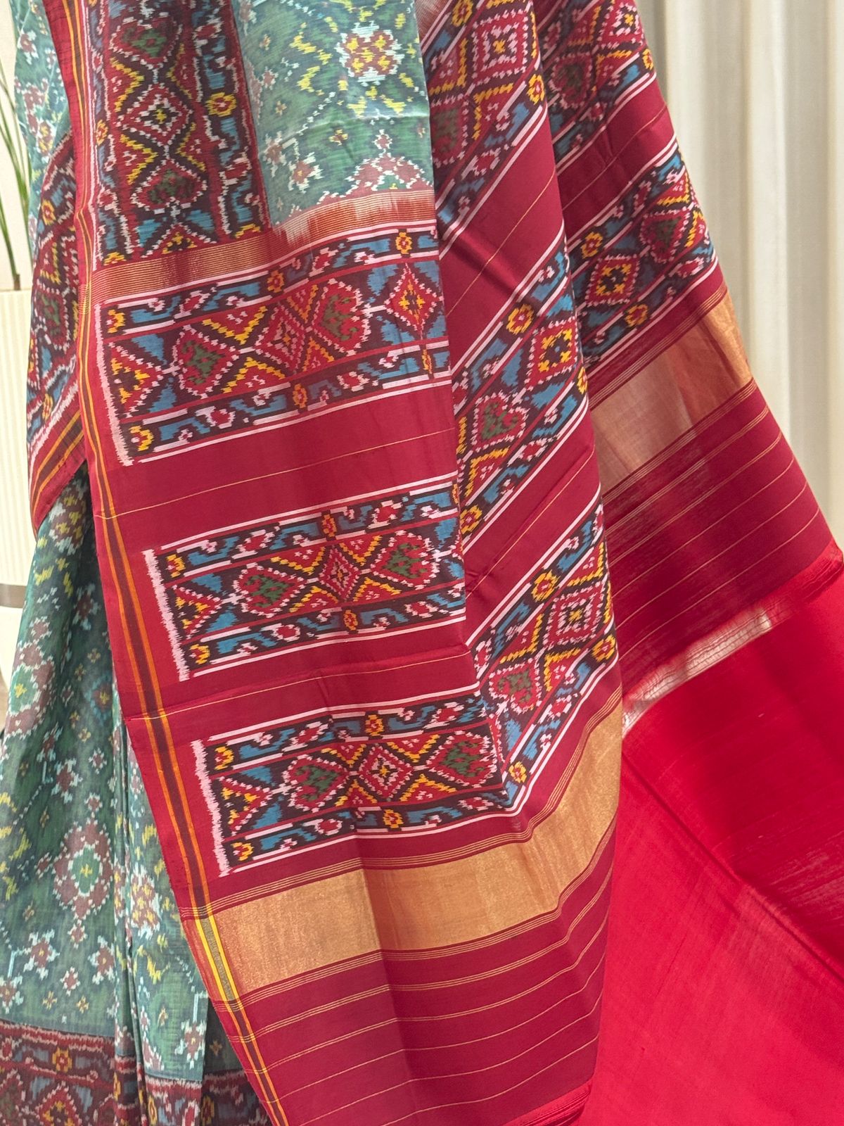 Maroon Green Handwoven Patola Elegance